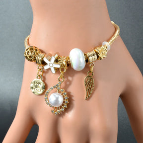 Pulsera De Plata Con Dijes - Bañado en oro