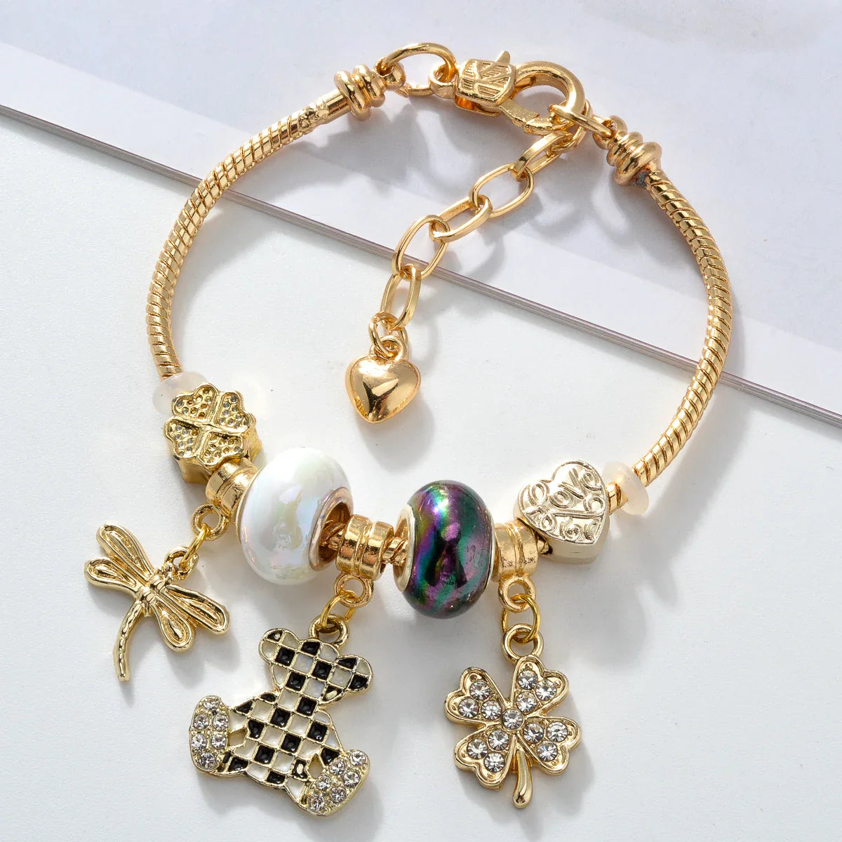 Pulsera De Plata Con Dijes - Bañado en oro