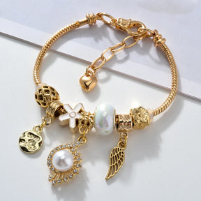 Pulsera De Plata Con Dijes - Bañado en oro