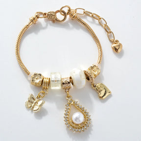 Pulsera De Plata Con Dijes - Bañado en oro